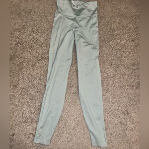 Green leggings, size XS